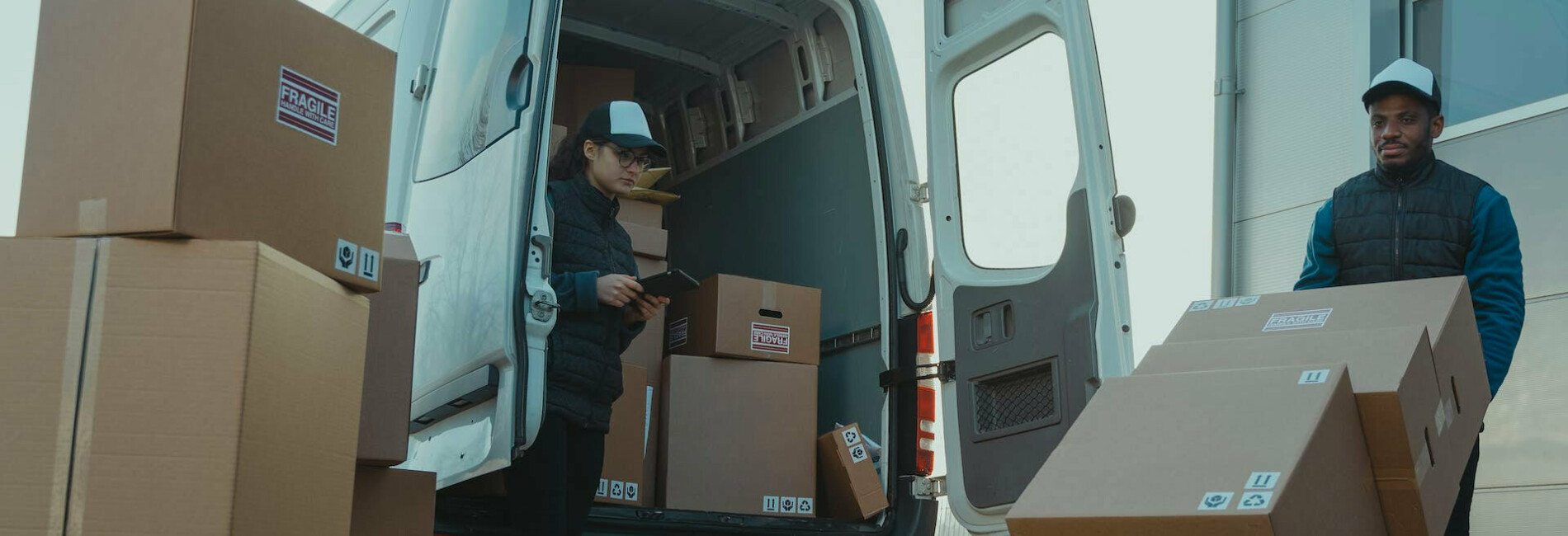 Workers Delivering Packages