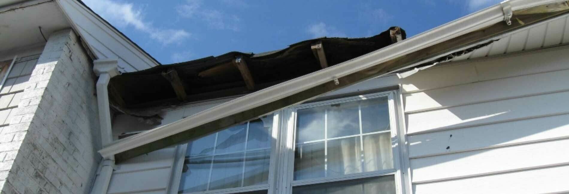 Damaged Roof and Gutter