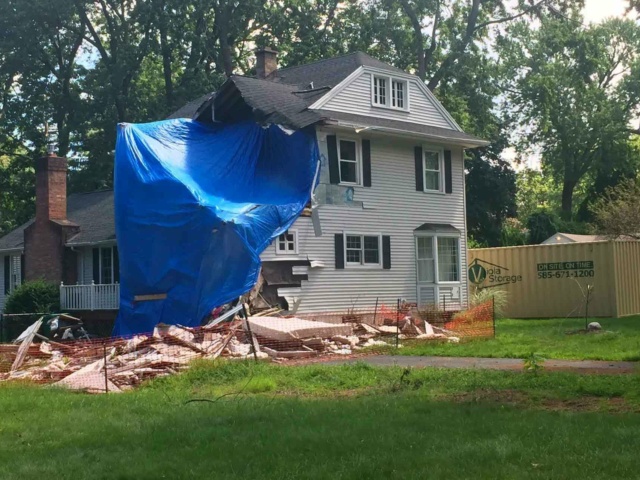 House Damage with Tarp Covering