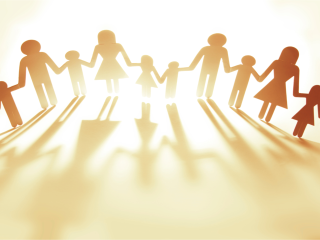 Paper cutouts of family holding hands Financial Assistance header