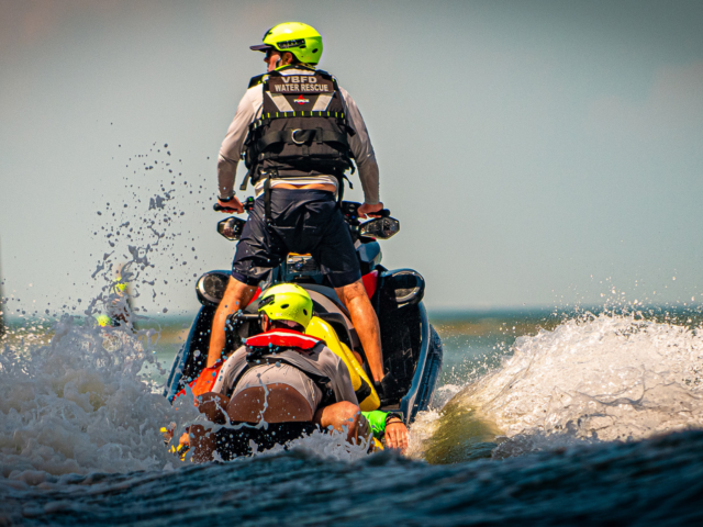Fire jet ski practicing water rescue