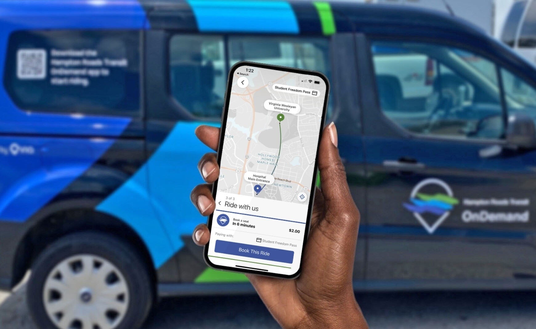 HRT On Demand vehicle with phone showing how to request ride on app